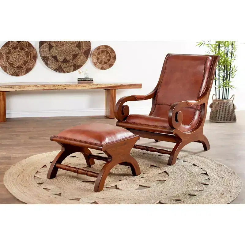 Poltrona accent in legno di teak tradizionale con braccioli e poggiapiedi rivestiti in pelle marrone